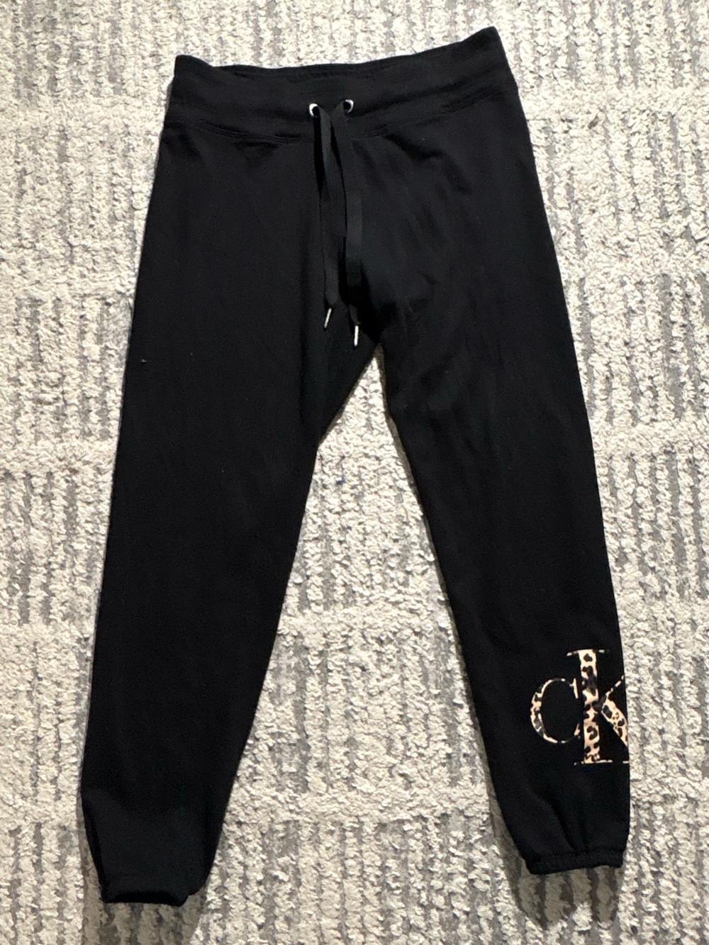 Calvin Klein black cheetah print logo sweatpants joggers size M